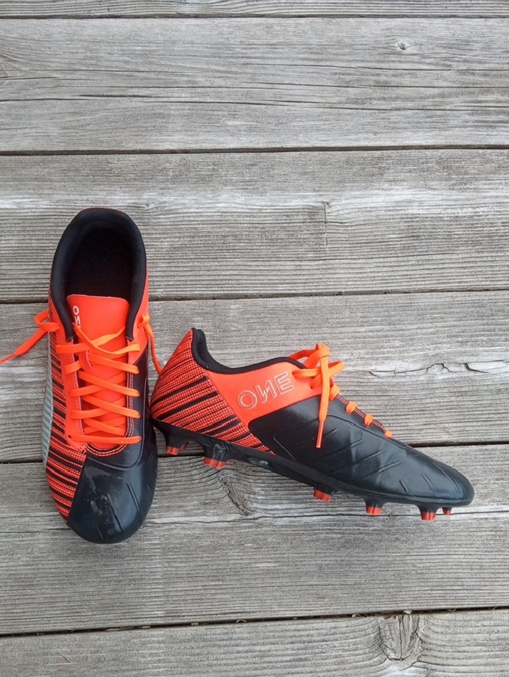 Puma Black and Orange Unisex Soccer Cleats